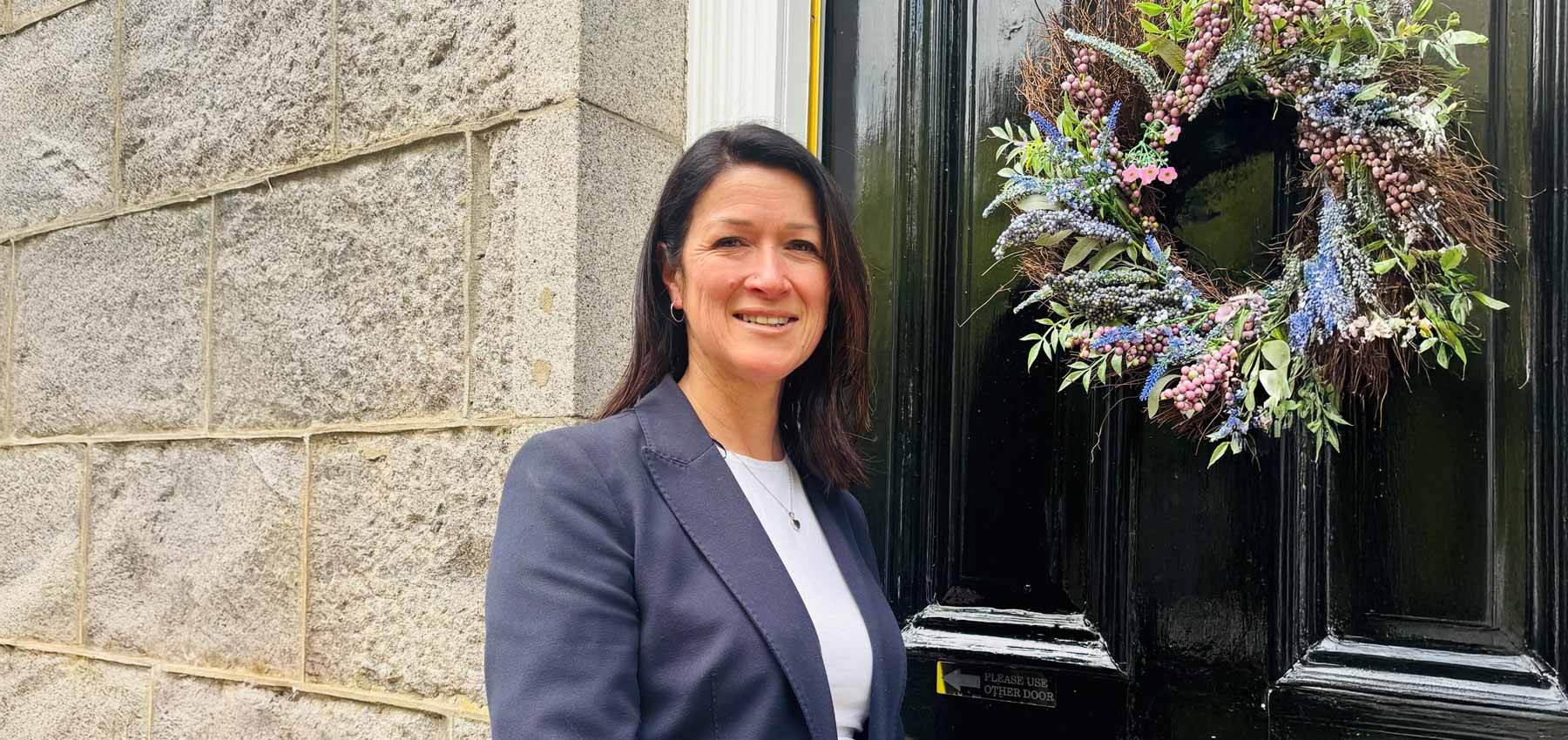 An image of Interim CEO Kim Woolner