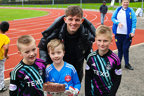 Leighton Clarkson at the Russell Anderson Sports camps with some young Aberdeen fans.